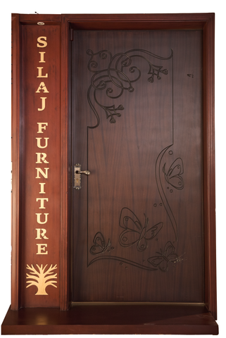 Designer entry door with butterfly and floral carvings in a warm wood finish and curved artistic lines